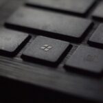 black laptop computer keyboard in closeup photo